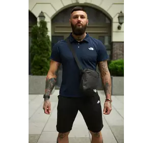 Комплект чоловічий TNF: поло синє + шорти чорні + барсетка чорна Комплект чоловічий TNF: поло синє + шорти чорні + барсетка чорна